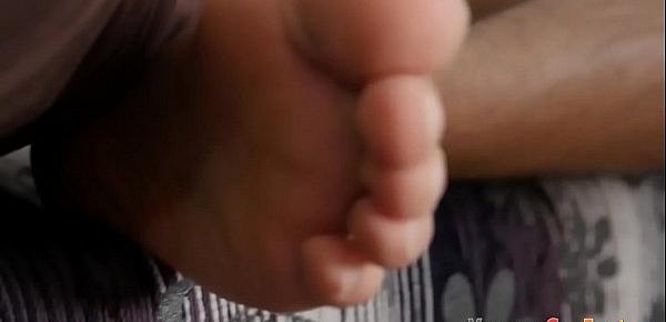  Gay foot fetish dude tugs cock